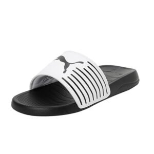 Puma black and white slide sandals with a wide white branded strap and cushioned black footbed, suitable for casual everyday wear.